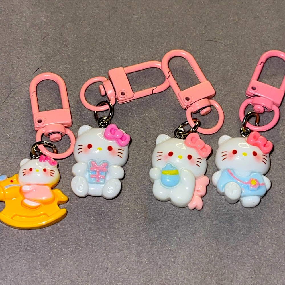 Hello Kitty Set of 4 Baby Themed Bag Charms. NIP